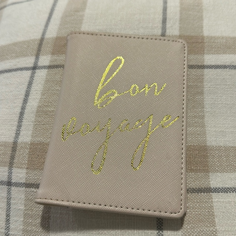 Nude “Bon Voyage” Passport Holder by Karma